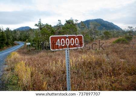 40000 sign with wooded rural background/ 40000 Sign