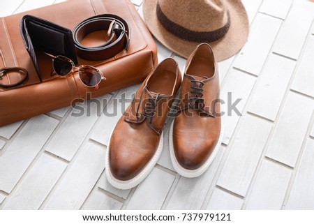 Set of mans fashion and accessories on brick wall background