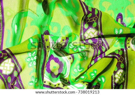 Background texture Green silk fabric with pattern. For a picture that is hard to forget, do not miss this Kelly Green and salad drawing Slim and light, it flows and moves to the waterfall.