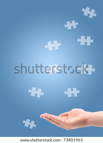 Jigsaw puzzle pieces isolated against a blue background