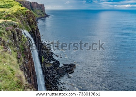 waterfall on the ocean Scotland Skye island "Kilt Rock"