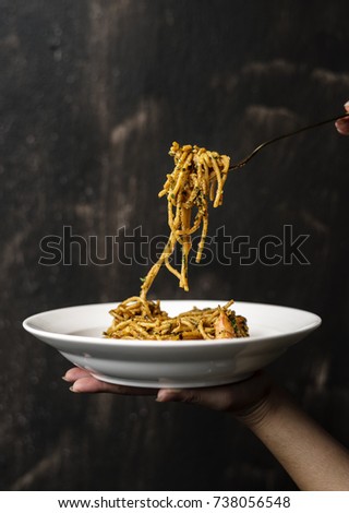 Food styling spaghetti plate closeup Royalty-Free Stock Photo #738056548