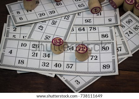Vintage lotto on a wooden background.