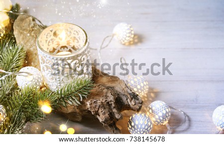 Cozy and soft winter background, knitted sweater and lights