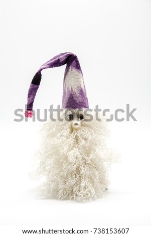 Gnome with big shaggy beard isolated in white background