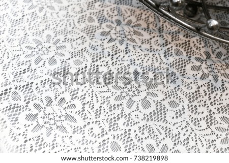 White tablecloth with flower pattern Used in the kitchen