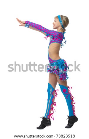 Beautiful young girl gymnast standing in nice gimnastics positionon, hands are prolate forward a white background, isolated