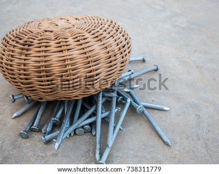 concrete tack with a basket on the floor