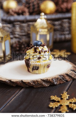 Christmas cupcakes with lights dark background