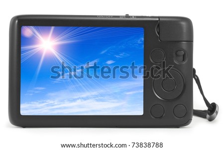 Photo camera isolated on white background with picture of sky