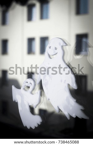 Halloween chidren's party toy ghost levitating flying in the air.