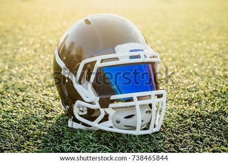 helmet for american football on the grass