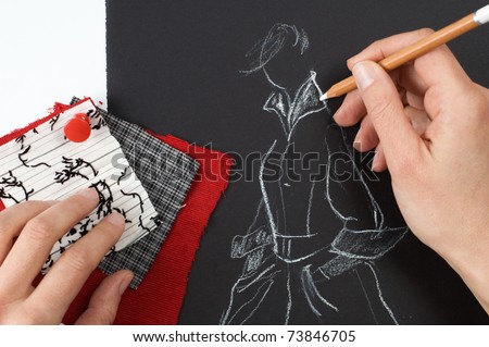 Fashion designer is drawing a fashion model