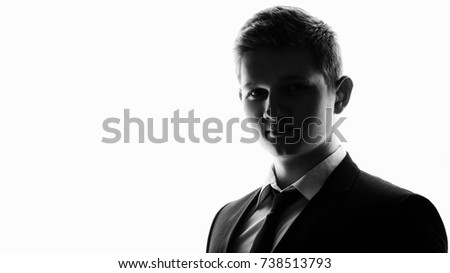one caucasian business man handsome full suit standing full length serious silhouette in studio isolated white background. Web banner size.