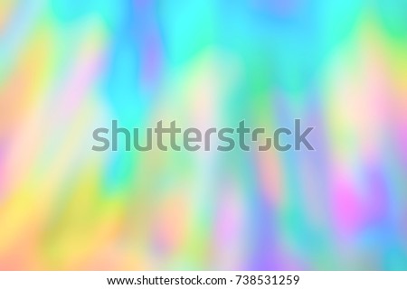 Blurred holographic psychedelic streaks texture background Royalty-Free Stock Photo #738531259