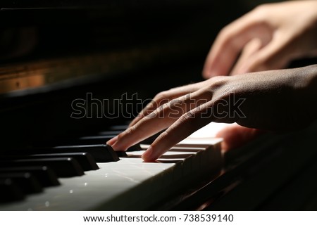 Playing Piano Close-up Shot Royalty-Free Stock Photo #738539140