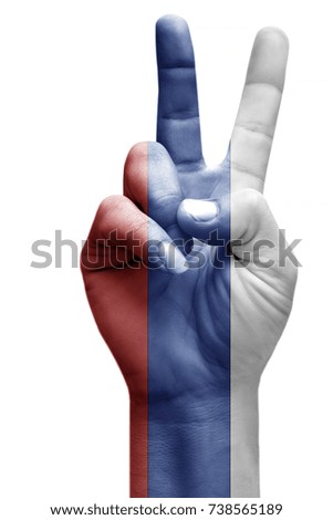 and making victory sign, Russia painted with flag as symbol of victory, win, success - isolated on white background