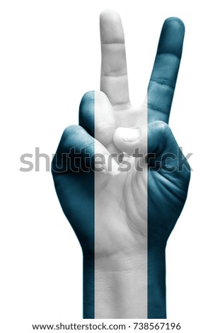 and making victory sign, El salvador painted with flag as symbol of victory, win, success - isolated on white background