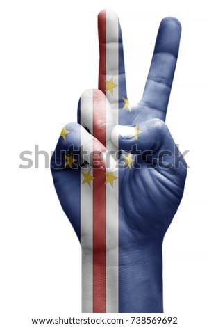 and making victory sign, Cape verde  painted with flag as symbol of victory, win, success - isolated on white background