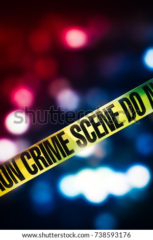 Crime scene tape with red and blue lights on the background