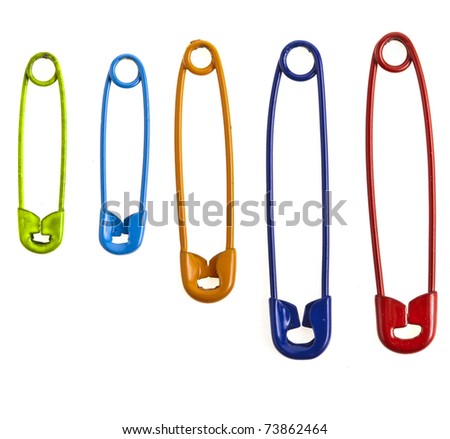 Colorful safety pins isolated on white background Royalty-Free Stock Photo #73862464