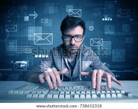 A talented young hacker hacking email address passwords concept with keyboard on desk and illustrated letters in the background