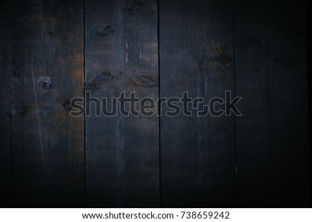 Rough grunge texture of black wooden background, closeup Royalty-Free Stock Photo #738659242