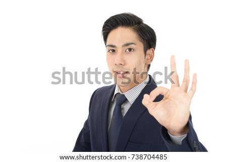 Businessman with ok hand sign