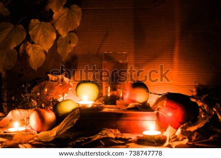 Beautiful picture of Thanksgiving day. Autumn, apple juice, apples. candles. The decor is autumn. 