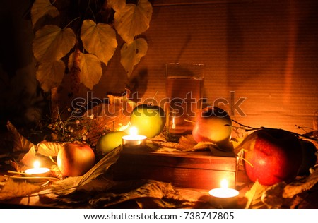 Beautiful picture of Thanksgiving day. Autumn, apple juice, apples. candles. The decor is autumn. 