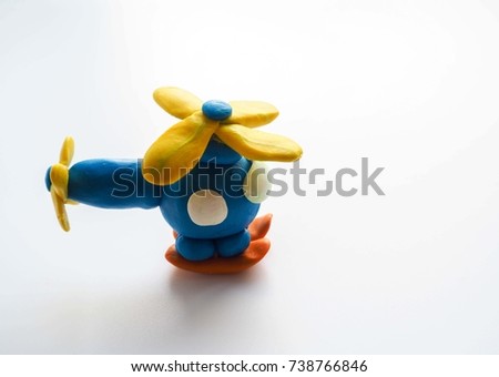 Clay figure: helicopter. Selective focus