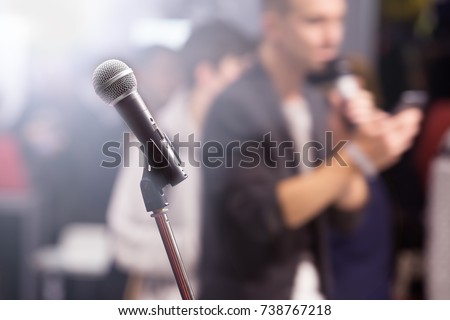 Microphone at blurred event background