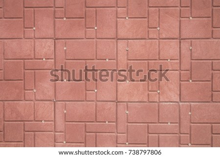 Red decorative tiles on the wall for the background.