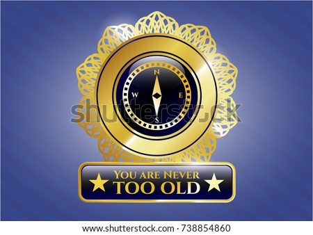  Gold badge with compass icon and You are Never too old text inside