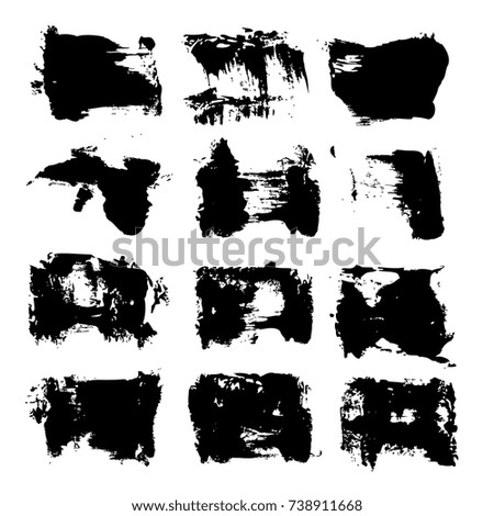 Textured black brush strokes isolated on a white background