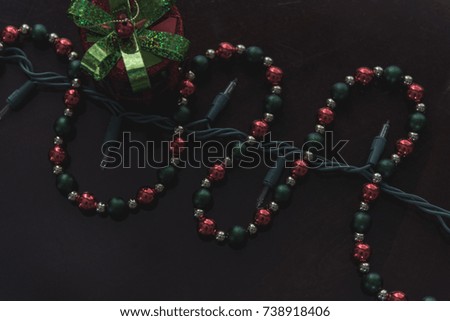 Christmas string beads with gift box and Christmas lights turn off - 
