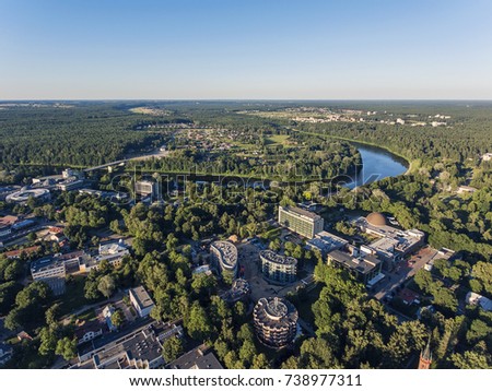 Aerial view over Druskininkai city near river Nemunas, Lithuania during summer time. Royalty-Free Stock Photo #738977311