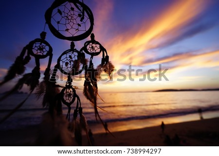 Dreamcatcher with sunset sea view landscape.