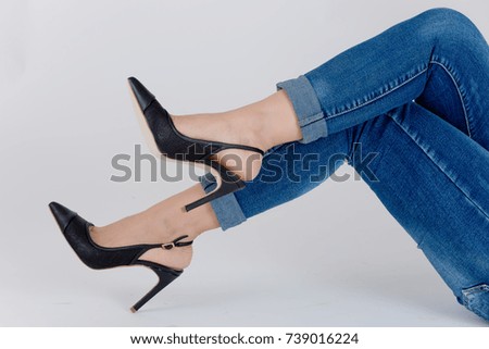 Women's Legs with High Heels Fashion in white background