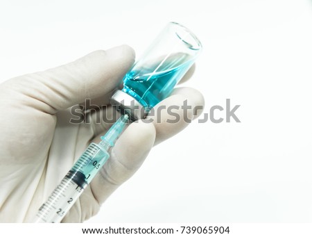 Pull out injection liquid by syringe Royalty-Free Stock Photo #739065904