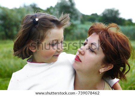 Happy mother and little daughter. Childhood and emotions