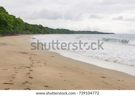 Tropical paradise beach in Costa Rica at cloudy day
