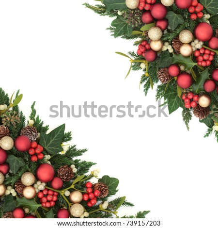 Christmas festive background border with red and gold bauble decorations, holly, ivy, mistletoe, fir and pine cones on white.