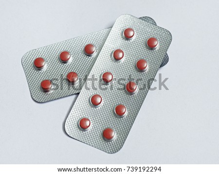 Tablets in bubble pack against white background