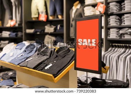 Sale banner and advertise frame in the shopping department store
