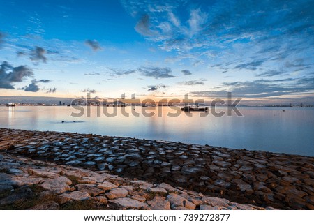 Sunrise or sunset landscape view by the shore for beautiful background