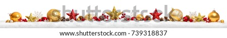 Christmas border or banner with stars and baubles arranged in a row on snow, extra wide and isolated on white background