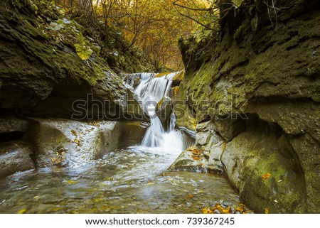 Beautiful silky waterfall in the autumn
