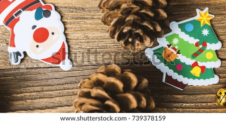 Brown pine cone ,Santa clause,  and Christmas tree prepare for Christmas 