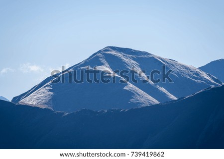Tatra mountain peak view in Slovakia in sunny day. blue perspective on multi layer hills